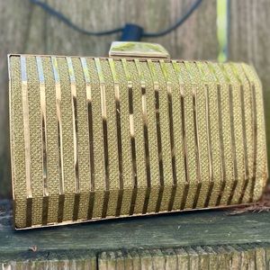 Metallic gold clutch